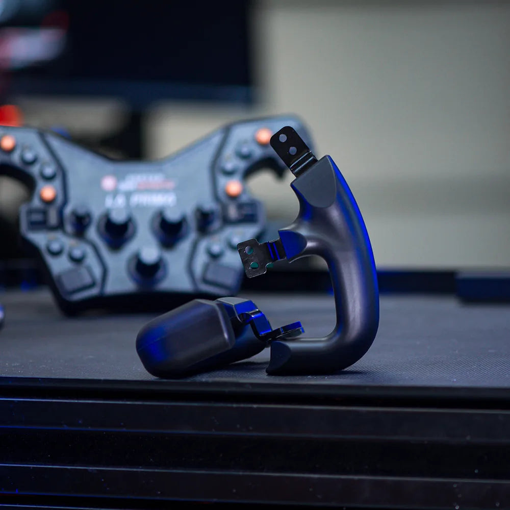 Asetek Racing LMP ratgreb til racerkørestol, sort med ergonomisk design og gripoverflade, velegnet til simracing.