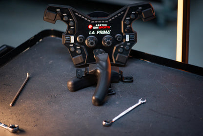 Asetek Racing Formel rattgreb med almindelige håndtag til racercykel, sort og ergonomisk design, synligt i billedet.